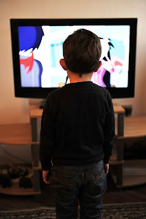 child watching television