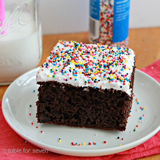 Chocolate Pudding Cake with Fluffy White Frosting • Table for Seven