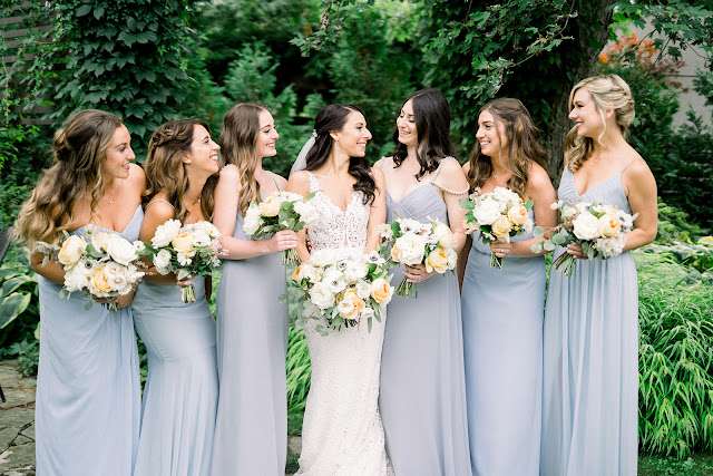 Niagara Wedding Planner | A Divine Affair | Sara and Daniel - Photo by Julia Park Photography. Ceremony and Reception at Kurtz Orchards Gracewood Estates. Ceremony under a chiffon draped tree. Reception in a tent with live edge wooden harvest tables. 
