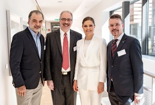 Crown Princess Victoria wore H&M Jacket with Tie Belt and H&M trousers at Tobias Registry's anniversary ceremony at Lund University Stockholm