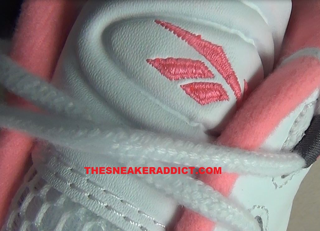 pink and white reebok classics