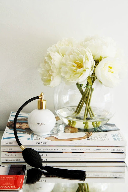 decoration details: white peonies and Vouge magazines