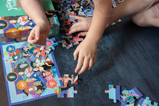 Lots of hands make fast work of the 100 piece Rebel Girls Jigsaw