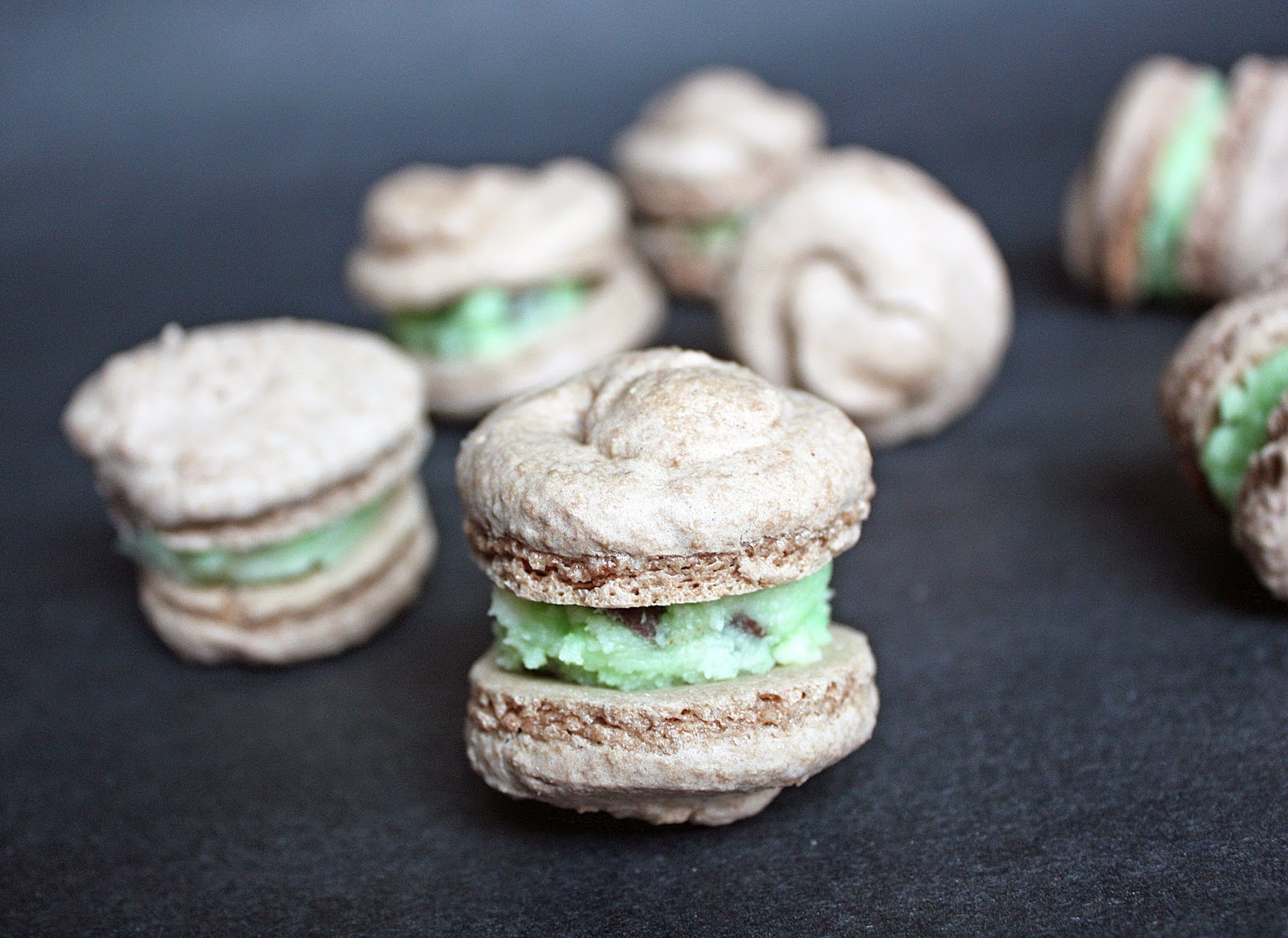 gluten-free vegan chocolate macarons with mint chocolate chip frosting