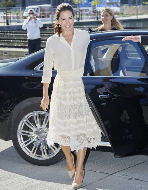 Crown Princess Mary attended the opening of 'Copenhagen Fashion Summit 2016' at the Copenhagen Concert Hall. Crown Princess Mary wore H&M Lace Skirt, Naledi Allana Clutch, Prada Pumps