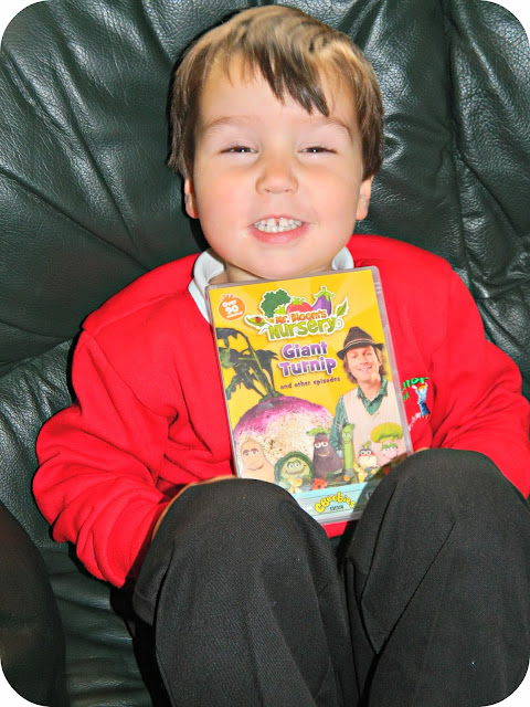 Small boy delighted with his Mr Bloom's Nursery Giant Turnip DVD cbeebies
