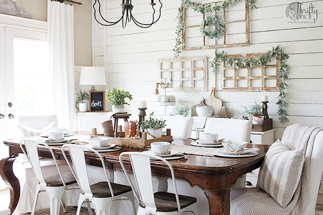 Summer dining room decor and decorating ideas. Farmhouse dining room decor. Farmhouse tablescape decor. DIY place setting ideas. Dining room buffet ideas. Farmhouse chandelier. Wood and metal chandelier. Dining room wall decor. Wood and white dining room decor.