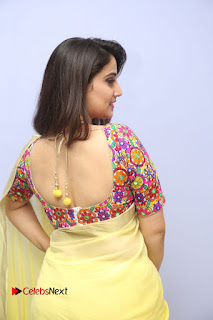 Telugu Actress Anchor Manjusha Stills in Yellow Saree at Janaki Ramudu Audio Launch  0028