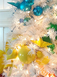 Christmas,Christmas Decor,Christmas Decor Themes,Christmas tree,color,color palettes,colorful home,decorating,diy decorating,DIY,holiday,seasonal,winter,ornaments,colorful Christmas,colorful Christmas decor, roygbiv,color gradient,rainbow aesthetic,decorating with color,merry and bright Christmas decor,garlands on Christmas trees,tree garlands,DIsneyland Christmas tree ornaments,Disney,rainbow swirl Christmas tree decor