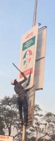 3 See what this man was caught doing to PDP posters in Kaduna