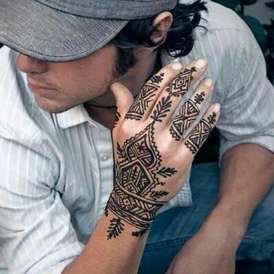 Picture Of Hand With Mehndi Tattoo  Free Stock Photo