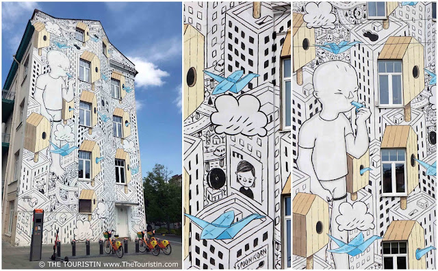 Facade with mural by Italian aritst Millo in Vilnius in Lithuania