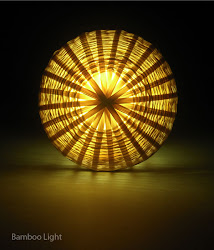 bamboo lights led tiki designboom torches lights2