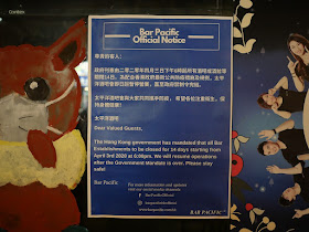 sign explaining bar is closed due to a Hong Kong government mandate