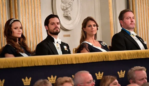 Crown Princess Victoria wore Filippa k  Faux Fur Jacket, Princess Madeleine wore Tiffany Rose Eden long maternity gown