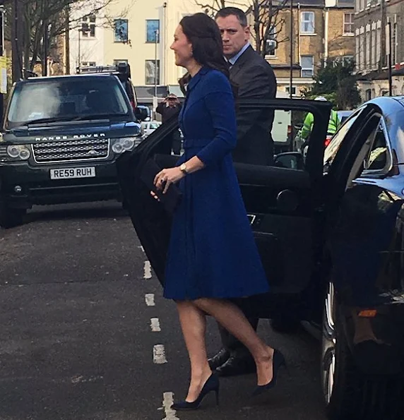 Kate Middleton wore Eponine London Belted Blue Coat, Gianvito Rossi Suade pumps, Russell and Bromley Clutch