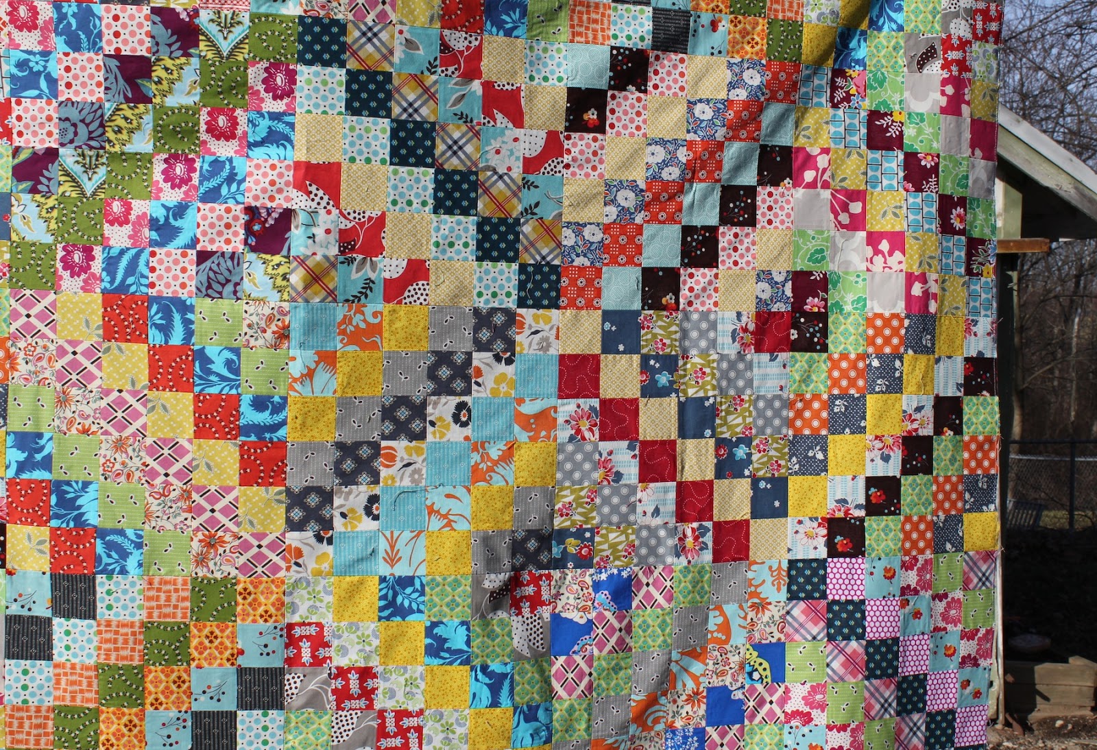 olive and ollie: my finished scrappy trip around the world quilt top