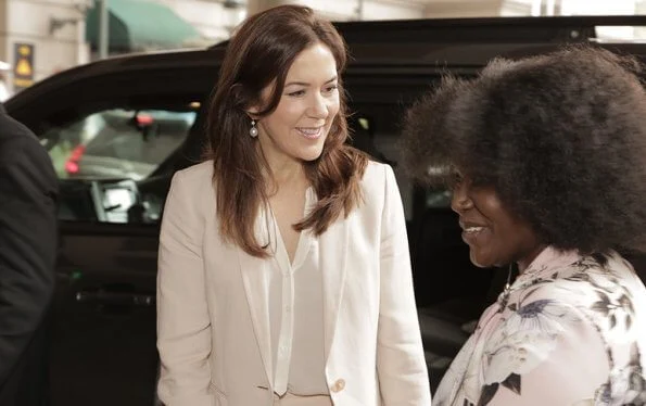 Crown Princess Mary wore Massimo Dutti blazer and trousers, with Gianvito Rossi python pumps, carries Prada saffiano bag