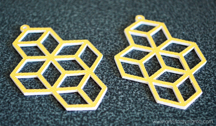 DIY Geometric Earrings at artsyfartsymama.com #paper #diyjewelry #ExploreCricut