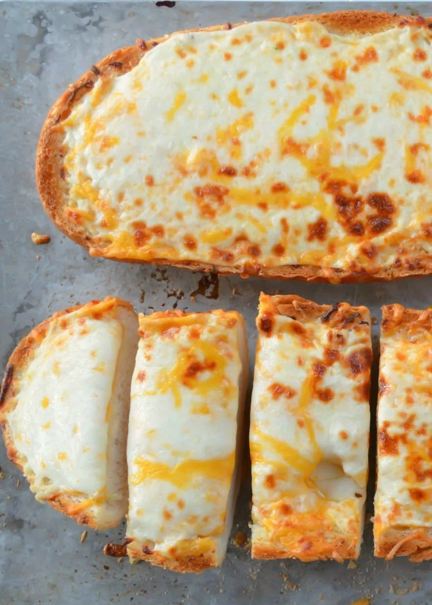 Colt's Cheesy Garlic Bread recipe is super easy to make side dish! A must for Italian night with lasagna or spaghetti from Serena Bakes Simply From Scratch.
