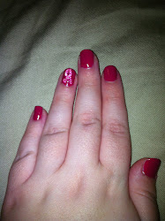 ribbon cancer breast nailed glare closeup sorry