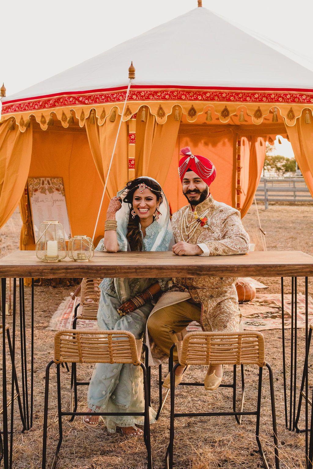smile darling photography indian weddings Gujarati bride cake floral design outdoor wedding camel red orange decor