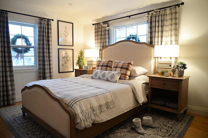 christmas bedroom decor, simple christmas bedroom, bedroom decorated for christmas plaid curtains, plaid pillows, stiped flannel bedding, windpane blanket, wreaths in windows
