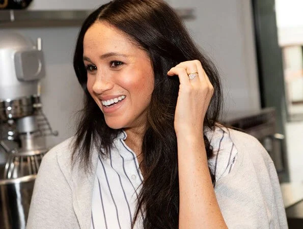 Meghan Markle wore WNU shirt, J.Crew Juliette blazer, Adina Reyter three diamond earrings, Adidas Stan Smith sneakers