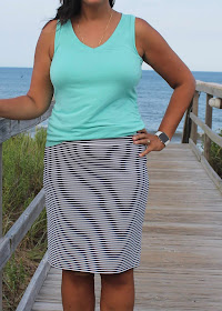 DIY striped knit skirt and v-neck tank top made from the Blank Slate Abrazo Tee pattern, modeled on the beach.