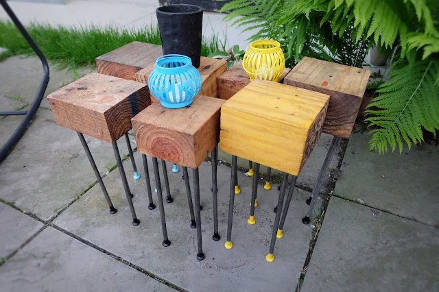 modular outdoor patio coffee table with pallet wood blocks and long nails