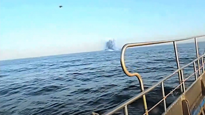 Jet speeds past the UFO that dived into the sea.