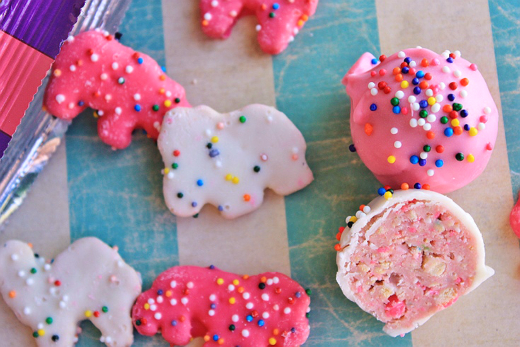 These adorable Circus Animal Cookie Truffles only have 4 ingredients and are perfect for Mother's Day, Baby Showers, Spring Celebrations, and more!