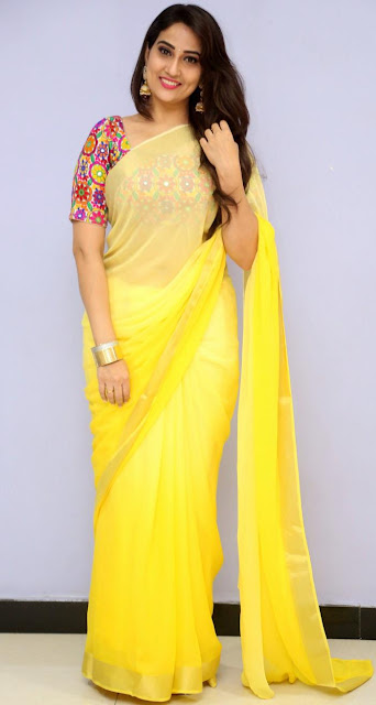 South Indian TV Actress Manjusha Stills In Traditional Yellow Saree 10