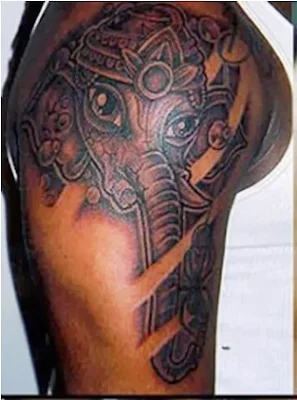 tatuagem em pele negra masculina - tatuagem no braço