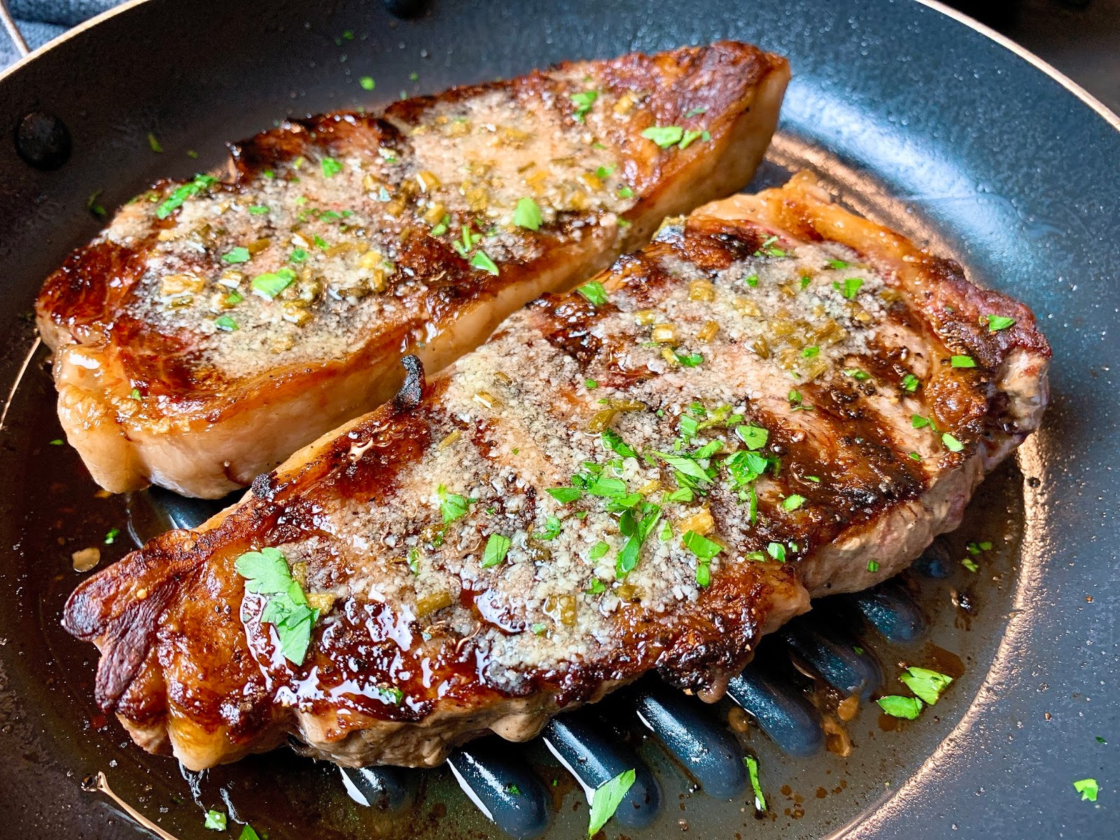 Steaks with ParmesanChive Butter