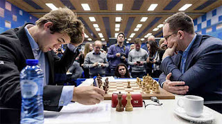 Tata Steel Chess R12: Pavel Eljanov (2755) 0-1 Magnus Carlsen (2840) - Photo © site officiel Tata Steel Chess R12: Pavel Eljanov (2755) 0-1 Magnus Carlsen (2840) - Photo © site officiel