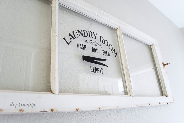 laundry room sign on window