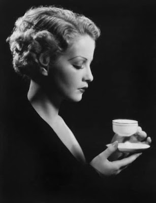 Sari Martiza drinking espresso