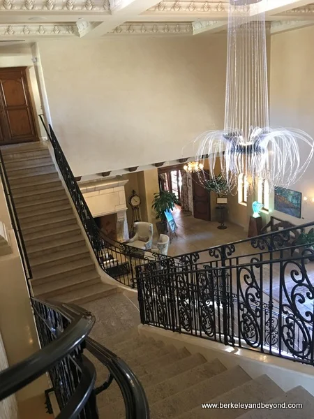 two-sided curved lobby staircase at Allegretto Vineyard Resort in Paso Robles, California