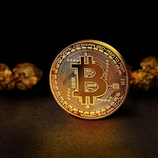 black background and golden color bitcoin