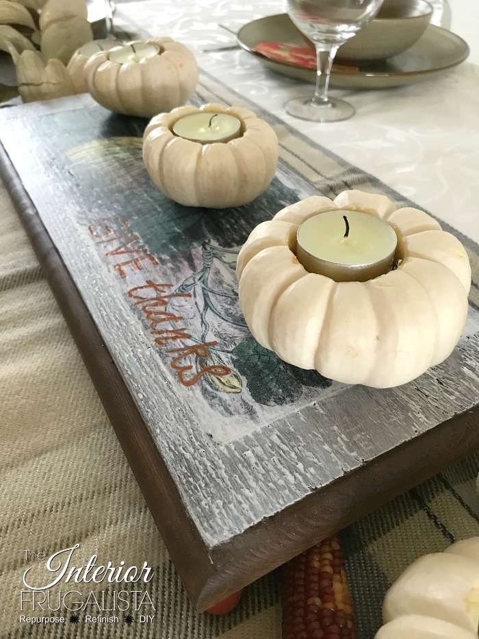 How to turn real mini pumpkins into tealight candle holders for fall plus tips for how to preserve the pumpkin stems to use for future fall crafts.