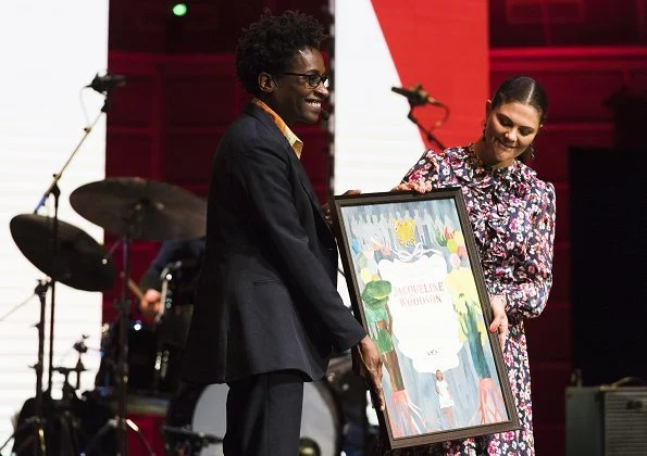 Crown Princess Victoria wore &Other Stories Floral Print Maxi Dress and By Malene Birger Paxilow pumps. American author Jacqueline Woodson