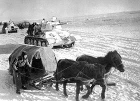 Soviet tanks and horses advancing during Operation Uranus worldwartwo.filminspector.com