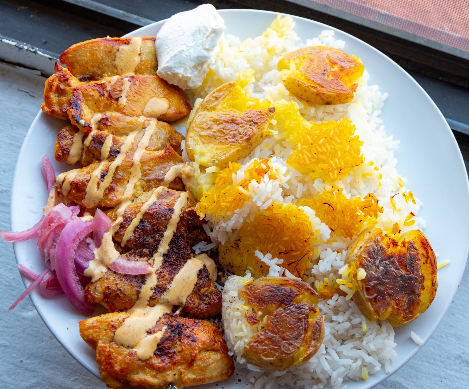 Smashed potato tahdig