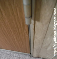 Lower door hinge pinching the door jamb This is the door hinge that is pinching the door frame