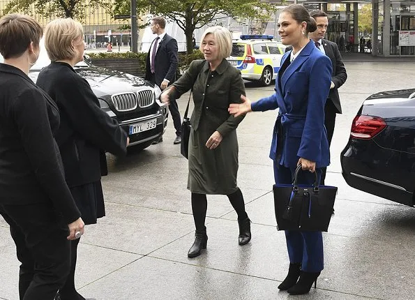 Crown Princess Victoria wore Af Klingberg Rakel Suede Nero Boots, Dagmar Taylor Tote Bag. Blue wool coat