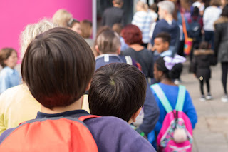 IMAGE: A crowd of students lined up