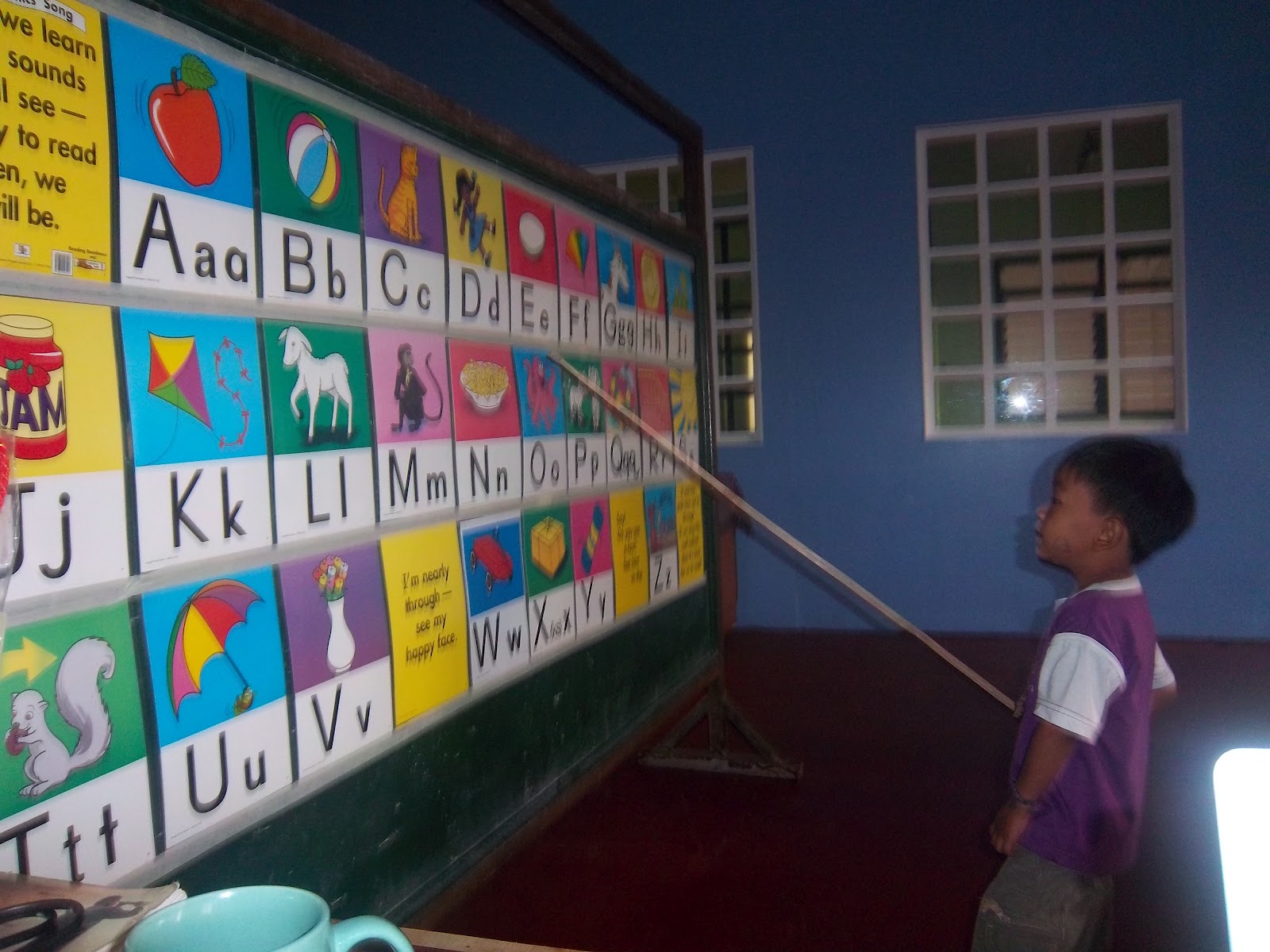 Children in the eyes of God: Sing, Spell, Read and Write