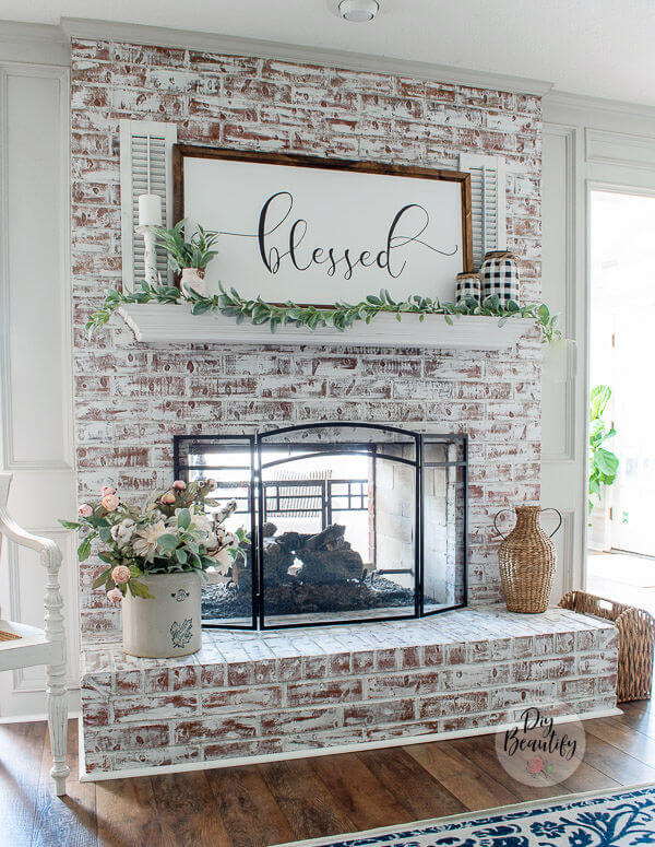whitewash brick fireplace