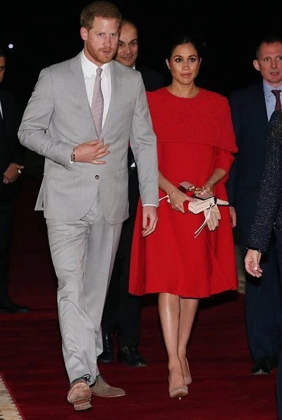 Meghan Markle wore bespoke Valentino dress with nude heels, gloves and a Valentino clutch bag